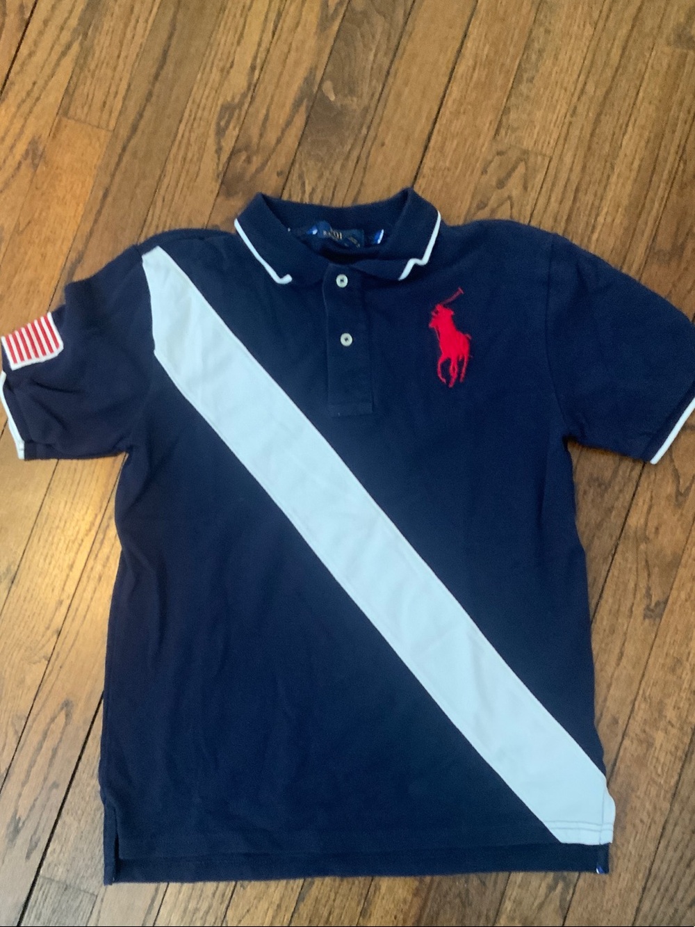 Boys, Ralph Lauren polo shirt navy with white stripe size large 14-16